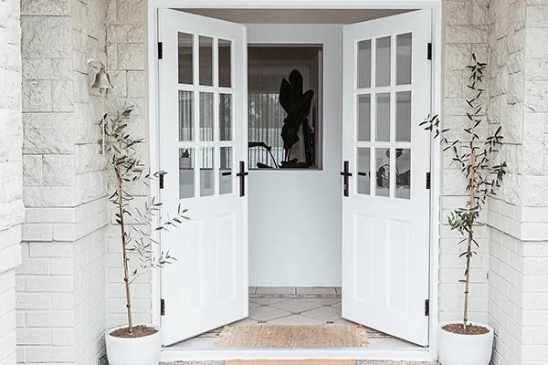 uPVC French doors installed in a duplex home in Coimbatore, Tamil Nadu — elegant double-panel uPVC doors providing natural light and seamless indoor-outdoor flow